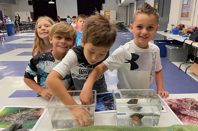 Kids at Mollusks on the Move